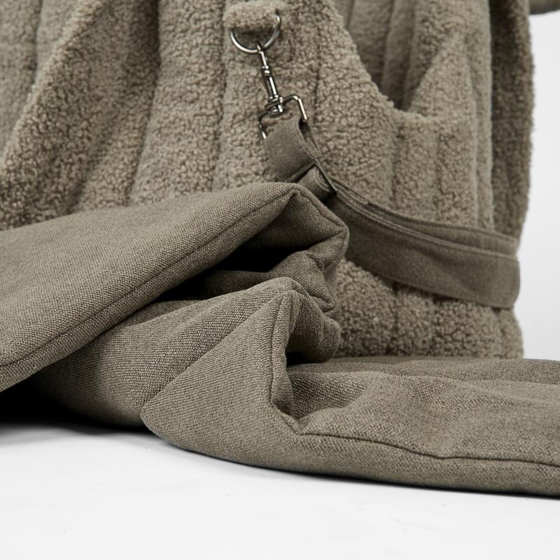 Inside the teddy Ella carrier bag with its safety clip and fleece mat