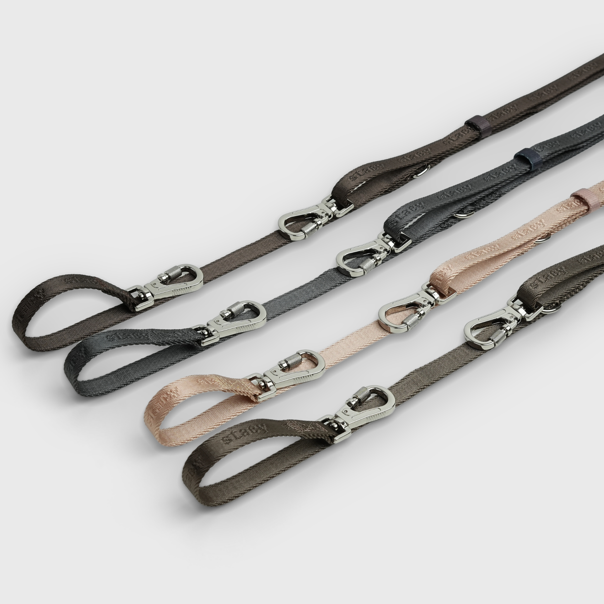 The hands-free dog leash shown in four colourways